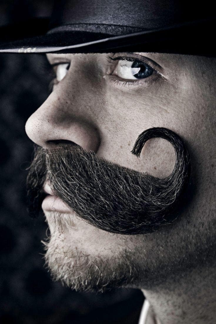 Mustach's man looking at you